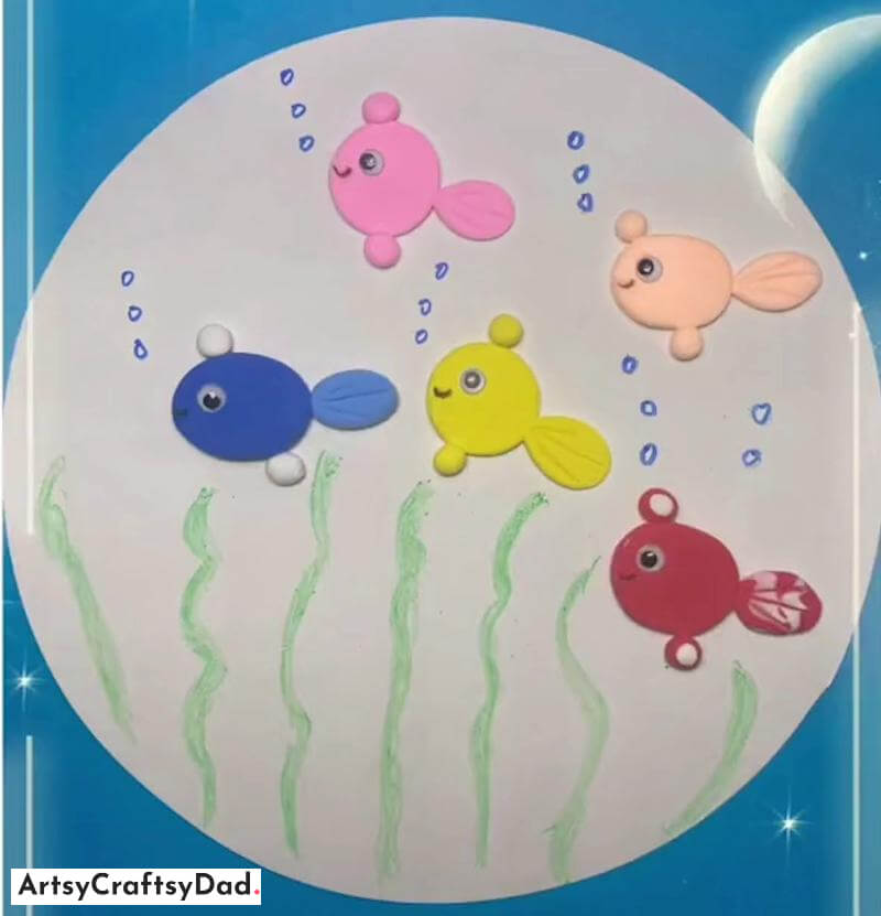 Colorful Fishes Using Clay - Art and Craft Activity - Crafting with Reused Materials on Round Circle