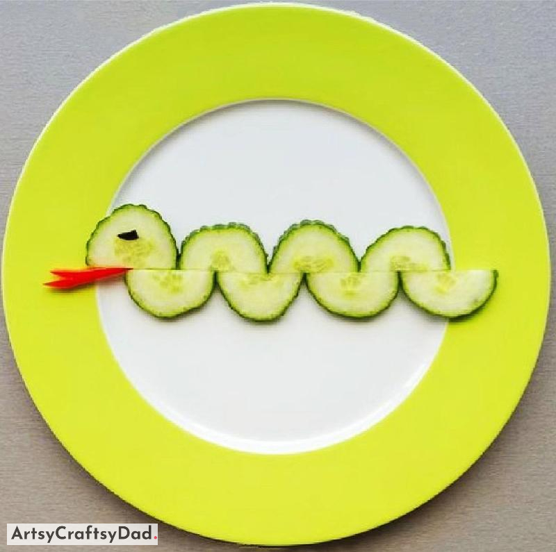 Cucumber Snake Food Plating Decoration Idea For Kids - Creative way to serve up cucumber to children in the form of a snake