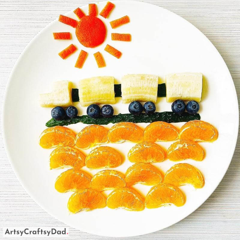 Fruit Train Food Decoration Idea on White Plate - Creating Something Special By Decorating Your Plate With Fruit