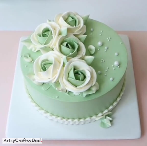 Green and White Rose Decoration on Green Fondant Cake - Home bakers have access to these lovely and effortless cake embellishment ideas