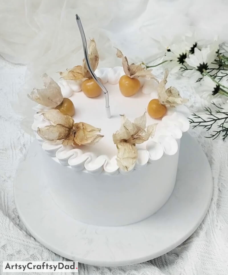 Light and Fluffy Vanilla Sponge Cake With Groundcherries & curved candle - Imaginative Cake Shaping & Decorating Strategies 