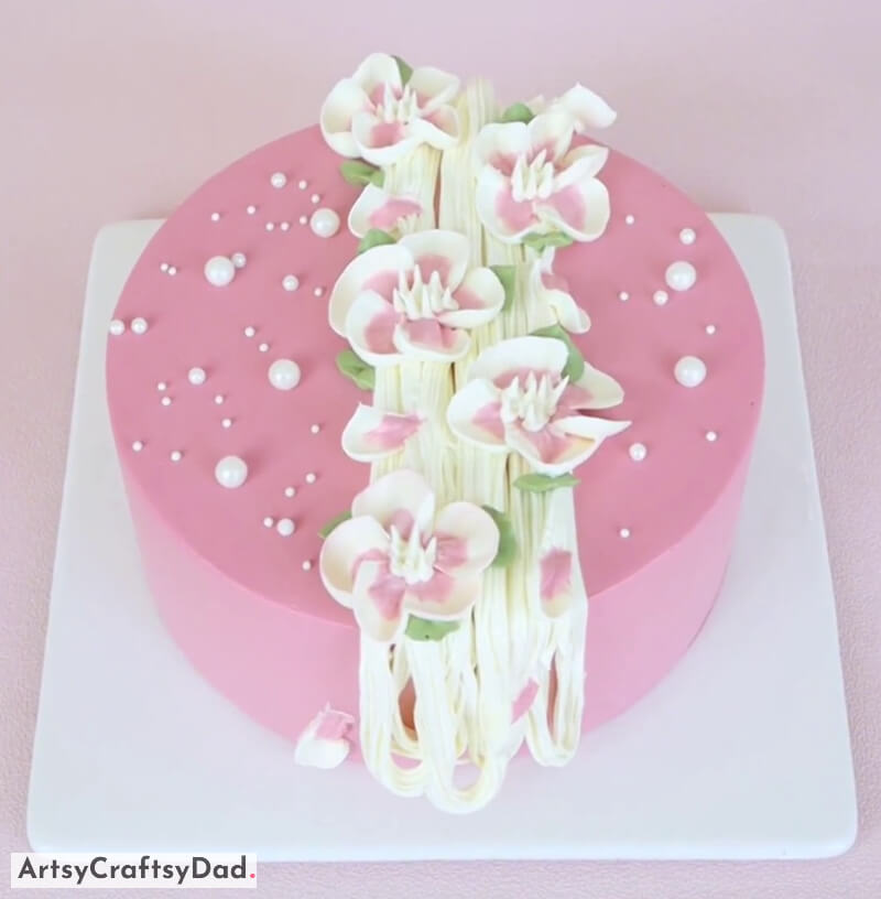Lovely Flowers Decoration on Pink Cake - Creative Ideas for Cake Decoration Utilizing White & Pink Cream