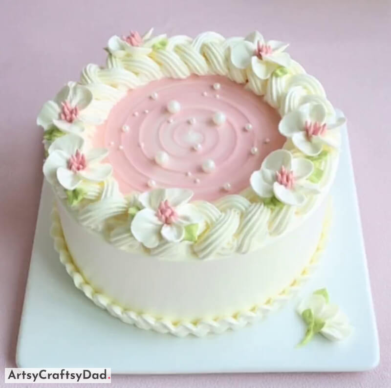 One-Tier Pink and White Flower Cake Design Idea With Pearl - Ideas on How to Use White & Pink Cream for Cake Design