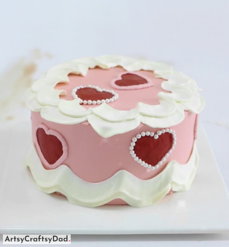 Red Hearts With Pearls Decoration on Pink and White Cake - Applying creative touches to cakes on Valentine's Day 