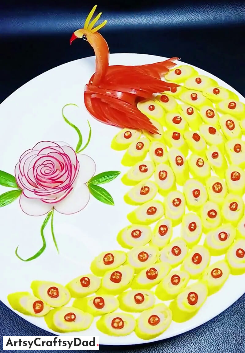 Red Radish Rose and Tomato Peacock with Green Apple Feathers - Food Decoration - Crafting ornamental displays with vegetables and fruits for plating