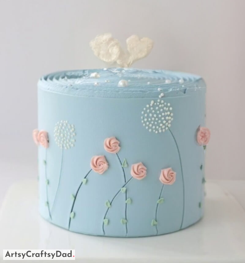 Simple Sky Blue Cake Decoration With Pink Rose and White Dandelion Flowers - Pretty Blossoms Cake Concepts