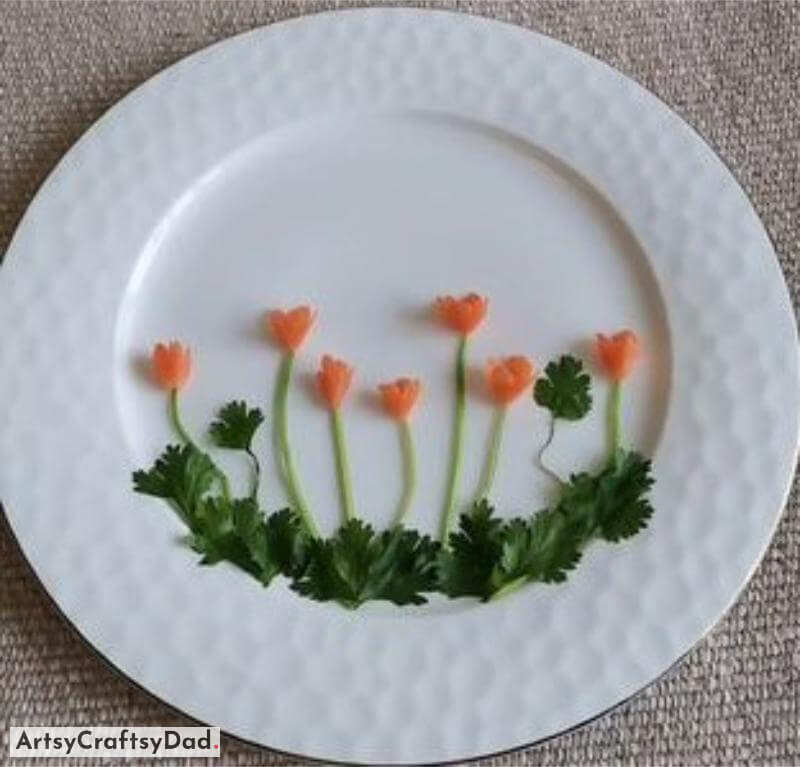 Small Carrot Flowers and Coriander Leaves Food Plate Decoration - Tasty Cuisine Adornment on White Dish