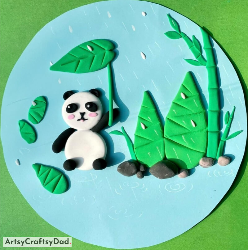 Sweet Panda Holding a Leaf Clay Craft Idea for Children - Fun Clay and Printing Projects for Youngsters 
