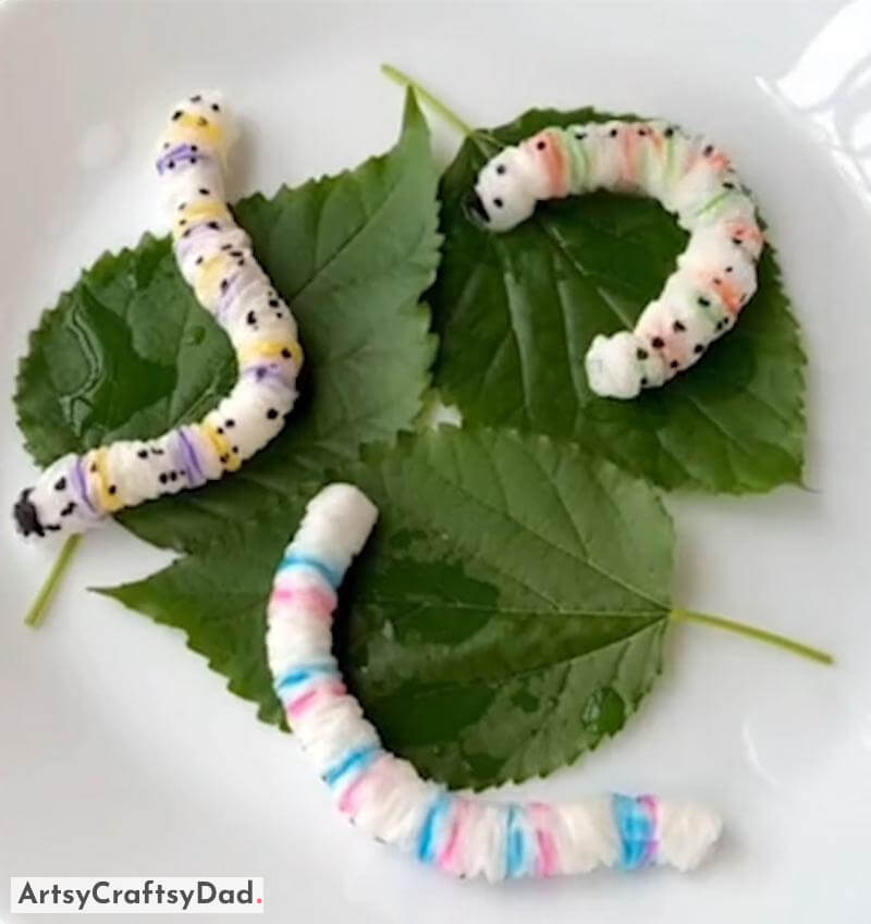 Tissue Paper Worms on Leaves Craft Idea for Kids - Making Fun and Simple Projects with Repurposed Materials for Children