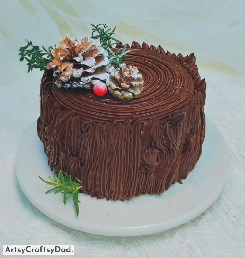 Tree Stump-Themed Cake Decoration Idea With Pinecone and cherry Toppers - Innovative Theme Cake Adornment 