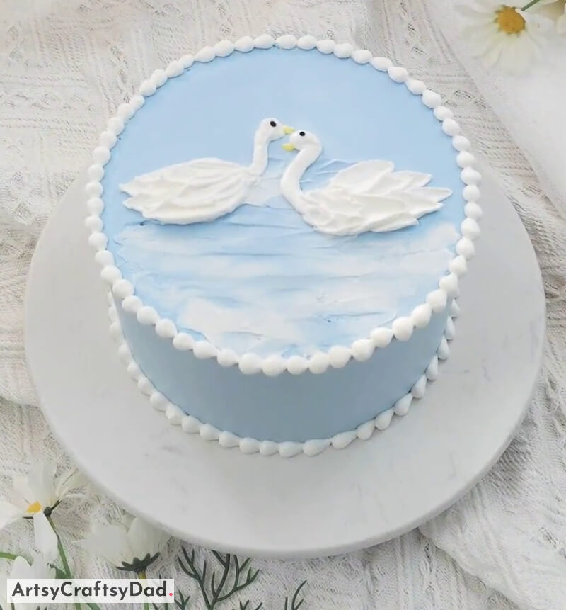 White Swan on Lake - Beautiful Cake Decoration For Kid's Birthday - Animal Themed Birthday Cake Decoration Suggestions For Kids
