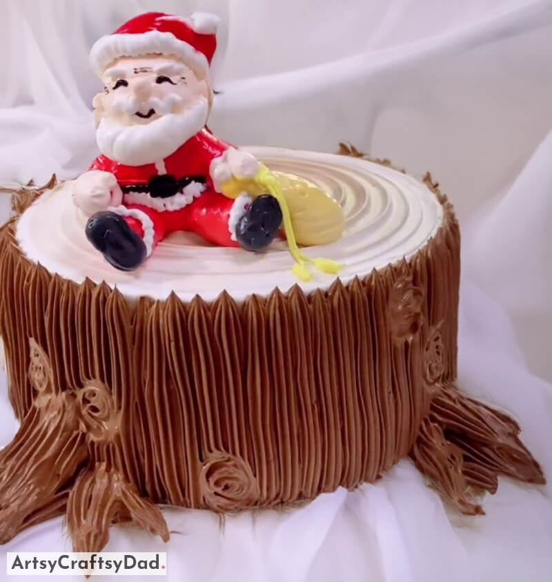 Wooden Log With Santa Topper Cake Decorating Idea - Brighten Up a Christmas Cake to Put a Smile on Everyone’s Face