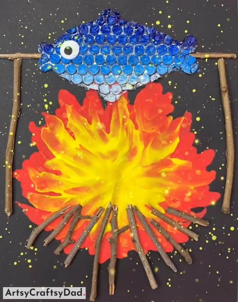 Wooden Stick Bonfire Craft Idea with Bubble Wrap Fish - Enjoyable Crafts for Little Ones Utilizing Reused Supplies 