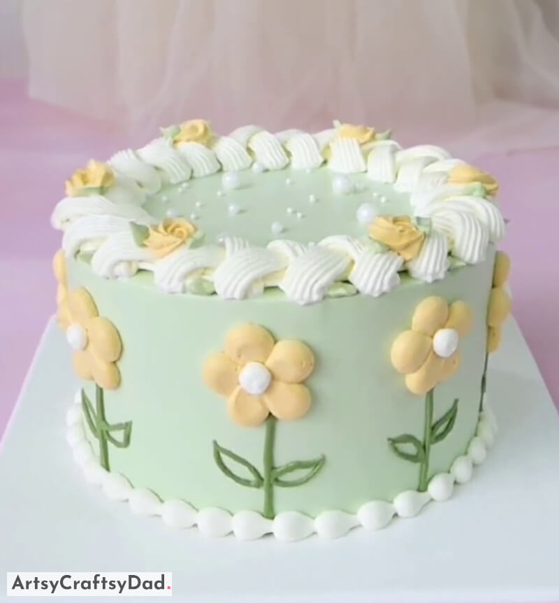 Yellow Flowers with Stem and Leaves - Cake Decoration Idea For Everyone - Make birthdays special with a light magenta buttercream flower cake