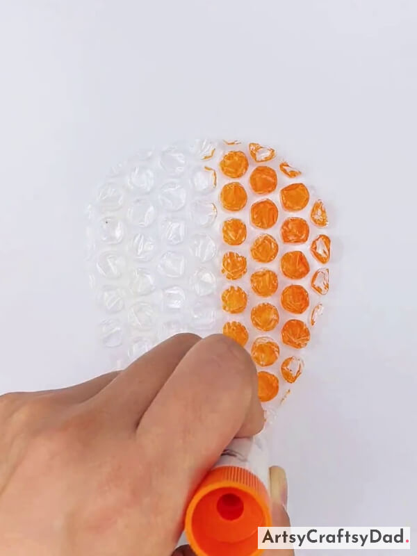 Coloring Half Bubble Wrap with Orange Color Sketch