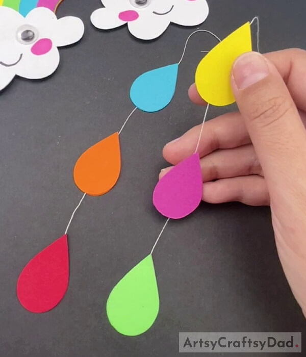 Pasting Other Paper Color Raindrops on Thread