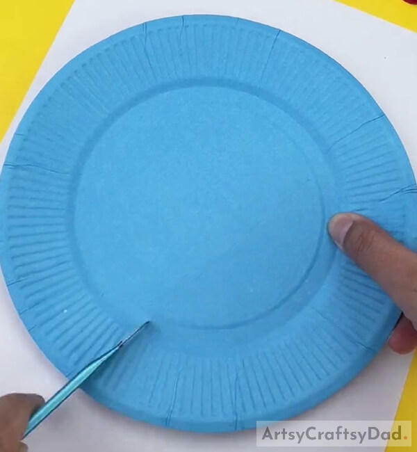 Taking a Sky Blue Color Paper Plate