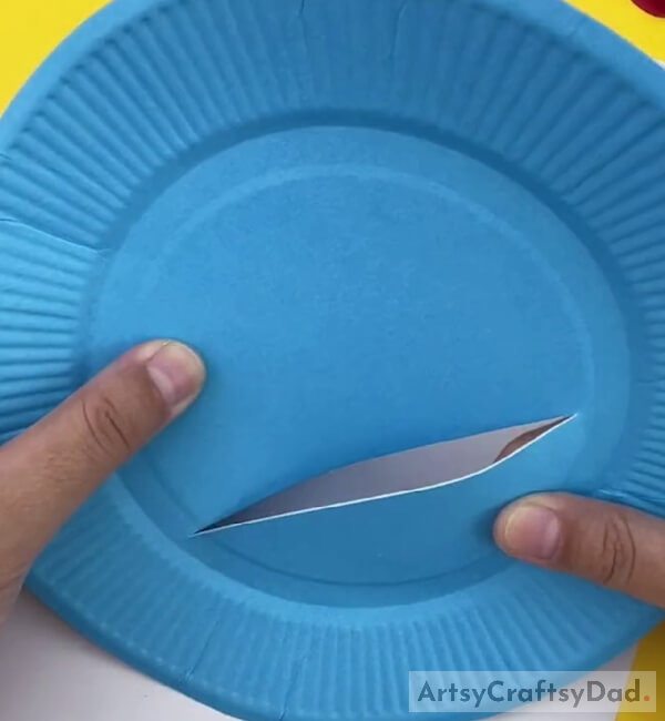 Cutting the Paper Plate Using Precise Knife