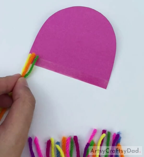 Pasting Colorful Yarn Pieces