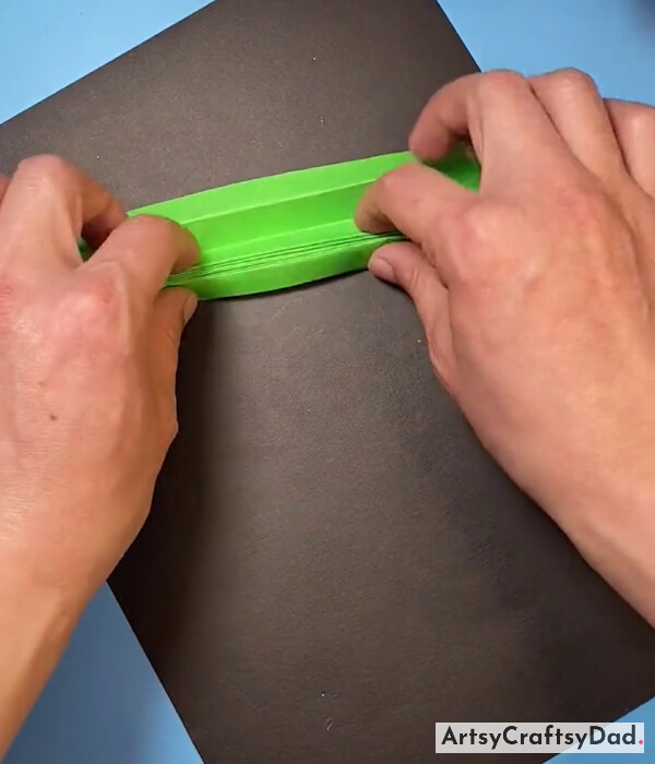 Make A Zig-Zag Strip By Folding Green Paper