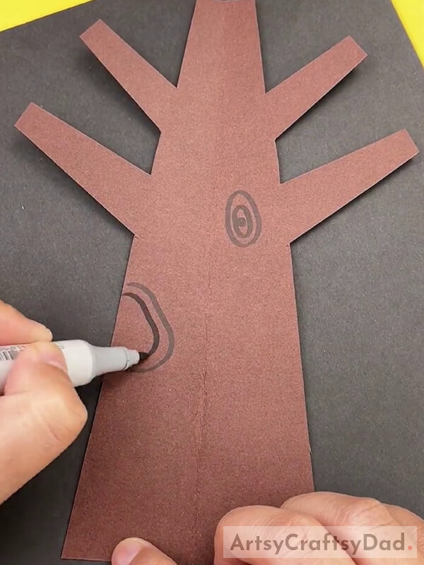 Detailing the Tree Trunk Using a Black Marker