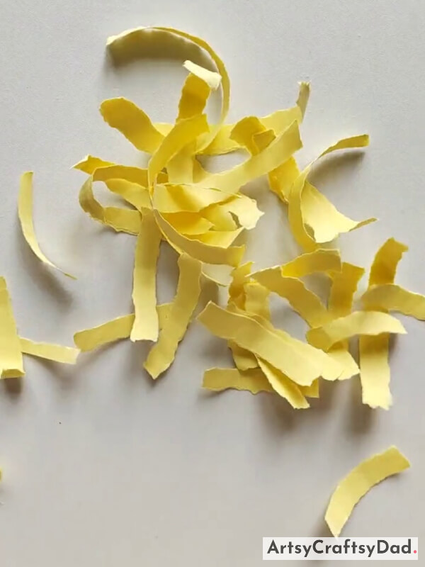 Tearing More Paper Strips