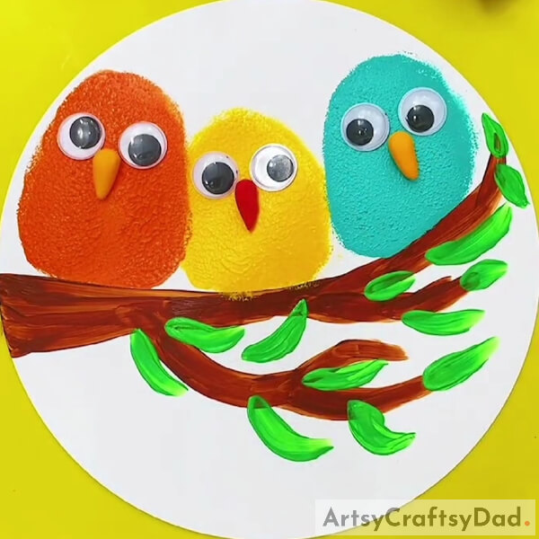 Finishing Attaching The Birds' Eyes And Nose- Discover the Techniques for Painting Birds on a Tree Branch in this Tutorial