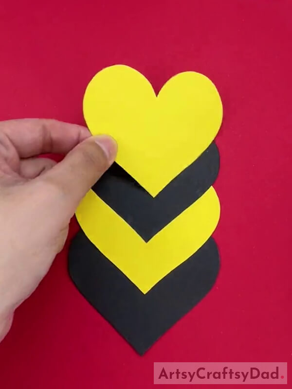 Pasting More Hearts of Black and Yellow Color