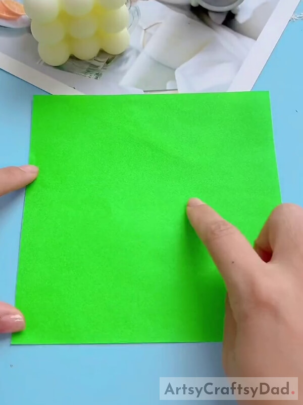 Taking Green Color Paper