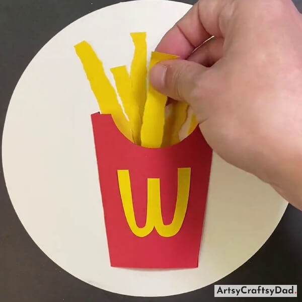 Putting Paper Fries in McDonald's Paper Bag