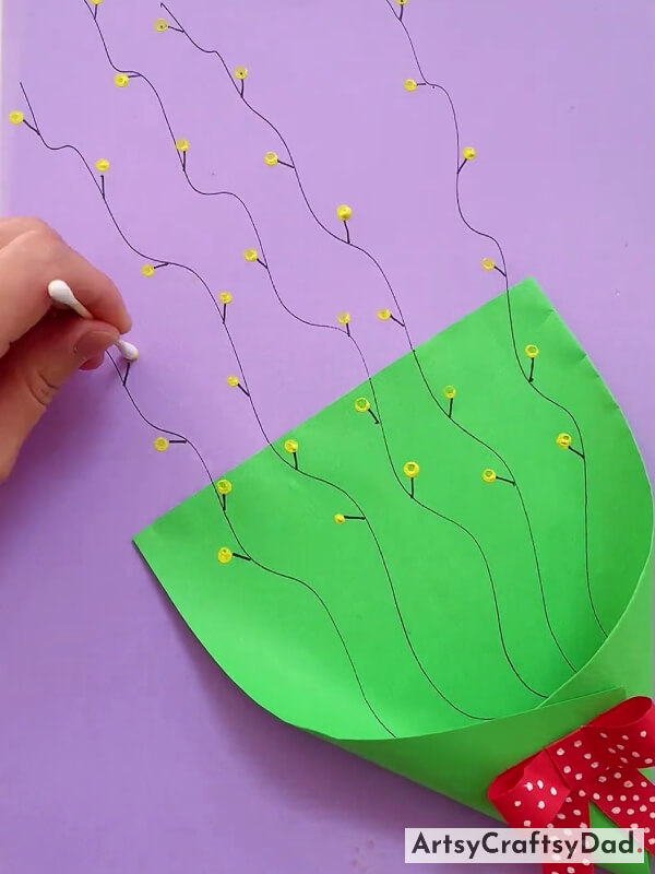 Drawing The Yellow Color Dots Using Cotton Buds