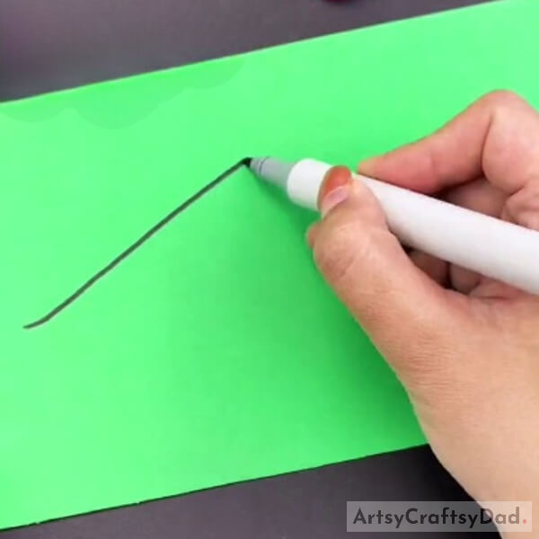 Drawing a Leaf Shape on a Green Sheet