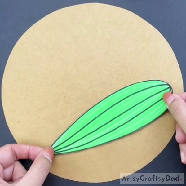 Pasting Leaf Shape on a Brown Paper Circle