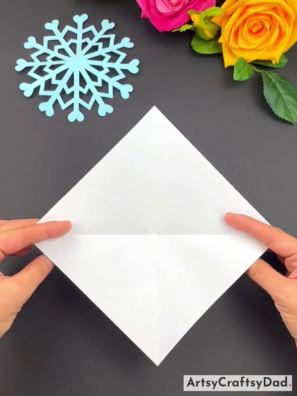 Making Creases By Folding Paper In Half
