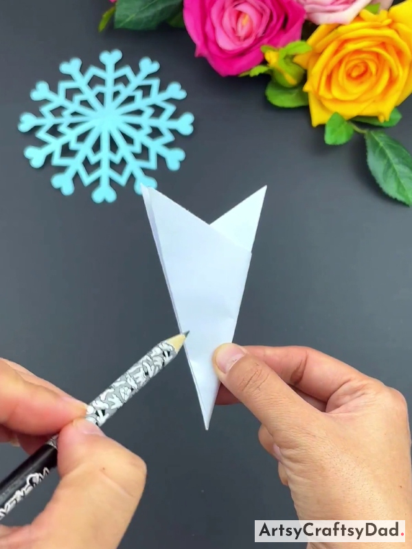 Drawing Snowflake Pattern On Paper