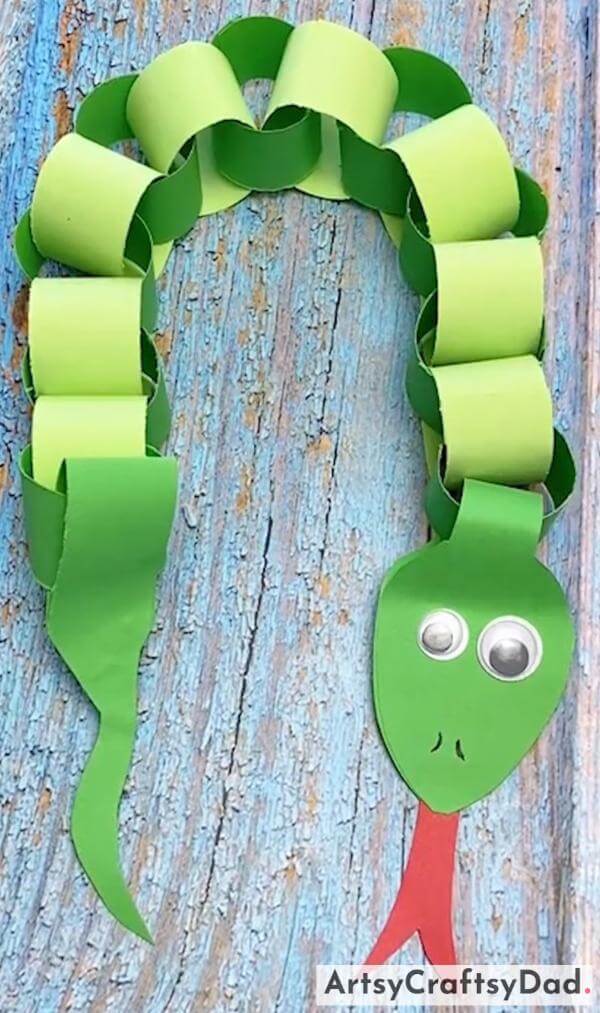 Amazing Paper Origami Snake Craft Idea for Young Ones-These cute animal crafts are sure to spark creativity in children. 
