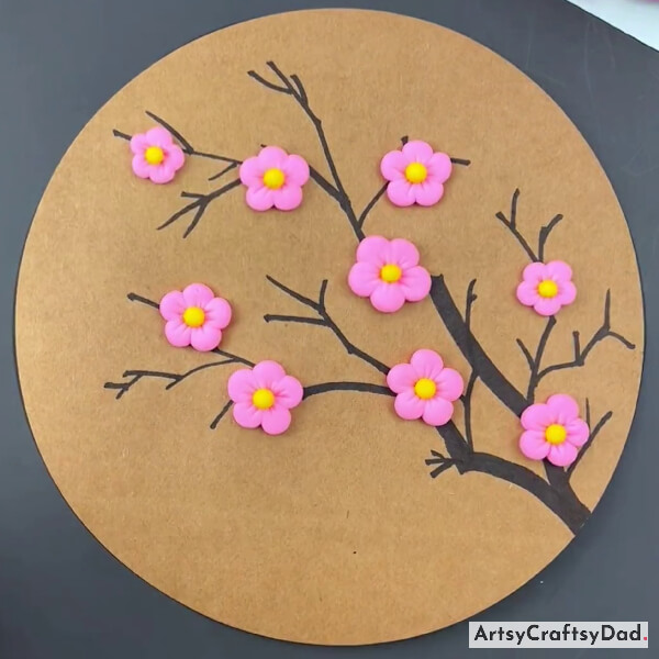 Pasting  Flowers On The Entire Tree