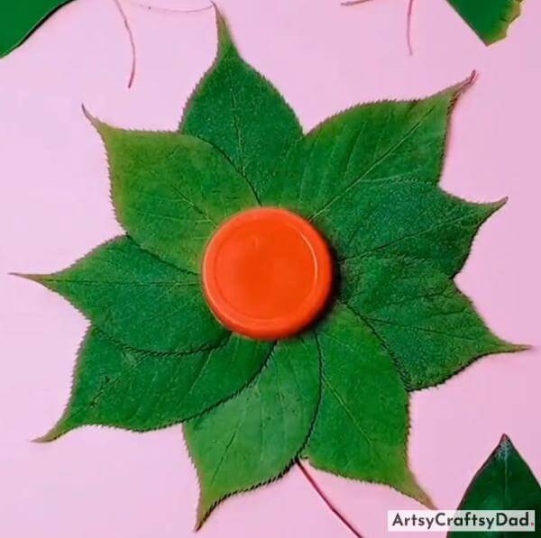 Easy To Make Flower Craft Using Leaves And Bottle Cap-Fun and Creative Leaf Craft Ideas for Kids