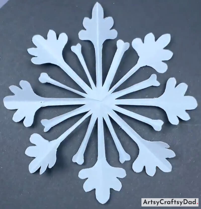 Easy To Make Paper Cutting Snowflake Craft For Kids- Easy and colorful paper craft ideas for children to create