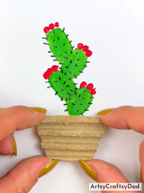 Pasting A Cardboard Cutout For Cactus Pot