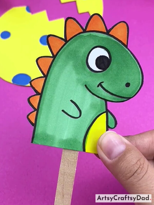 Pasting Dinosaur On Ice Cream Stick