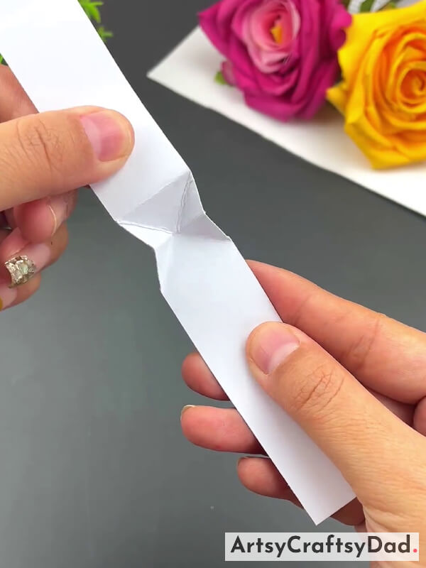 Unfolding The Paper Strap