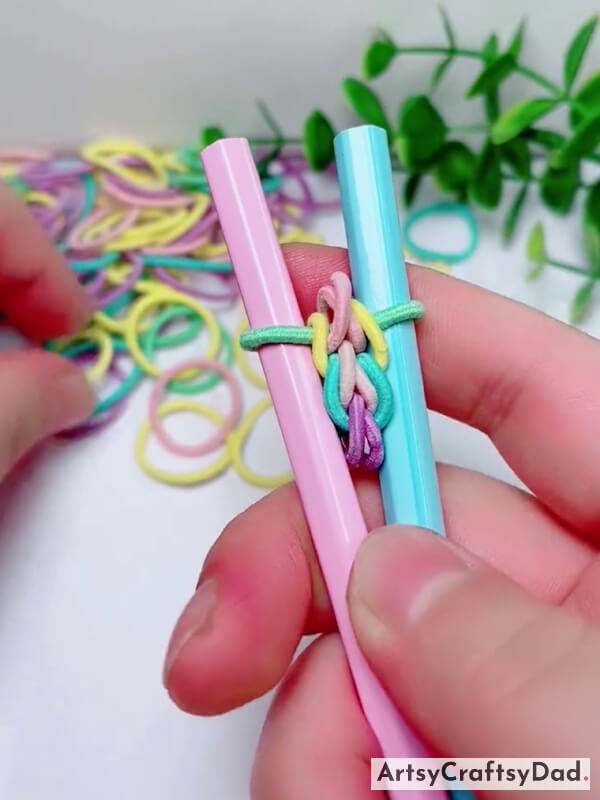 Pushing Down Bands On Pencils