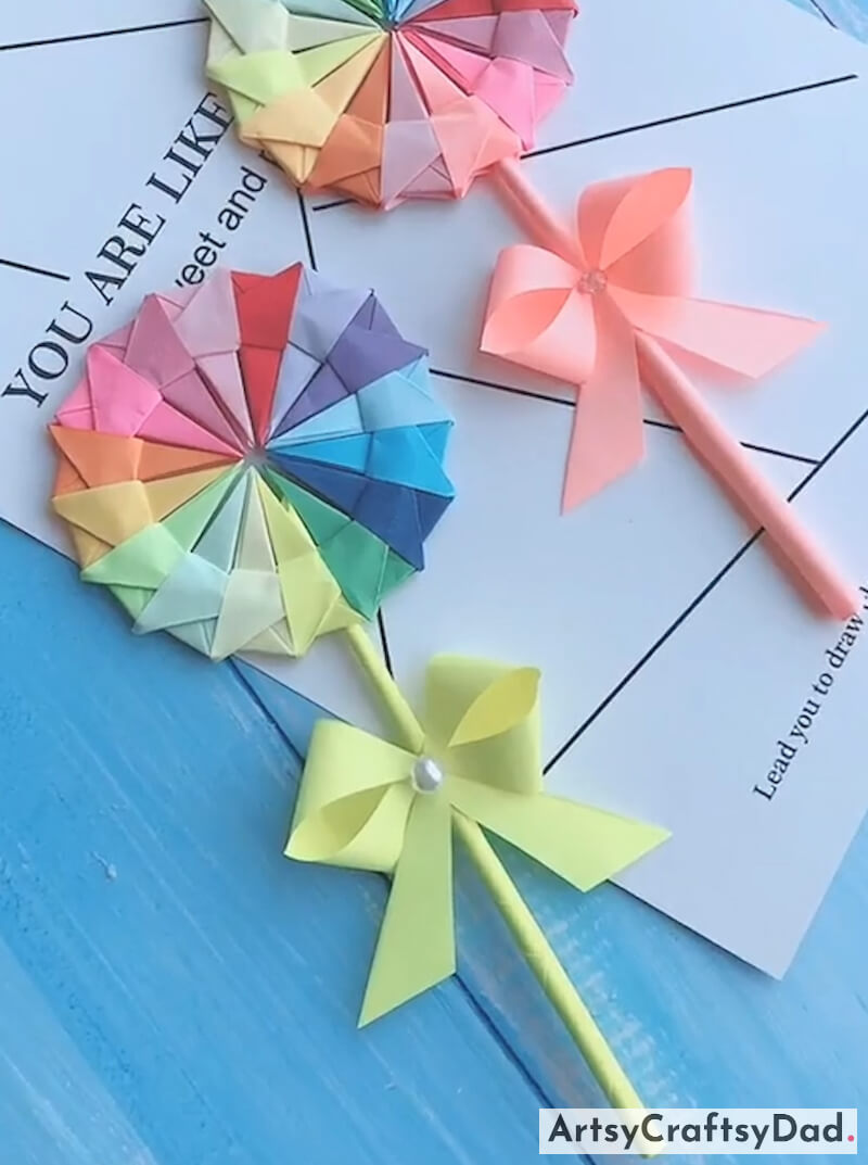 Make Your Own Origami Paper Lollipop Craft In 5 Minutes-Engaging in origami paper crafts with an assortment of vibrant colors can be a fun and educational activity for children
