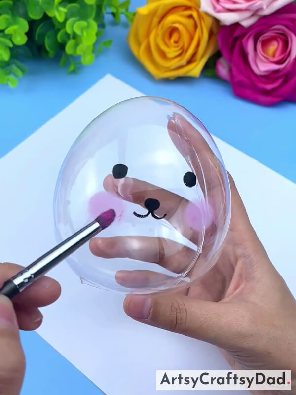 Taking A Pink Color Brush