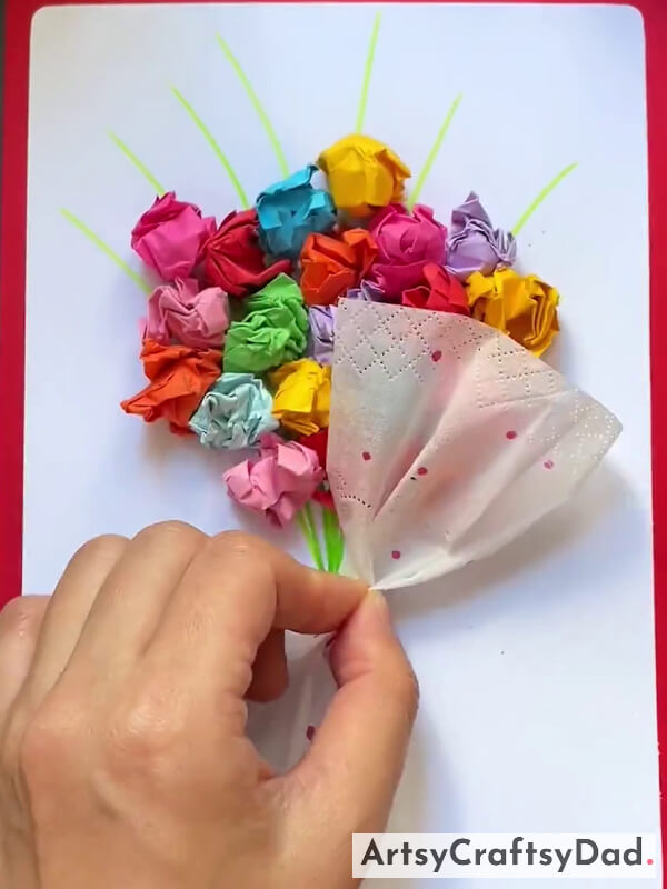 Holding The Tissue Paper