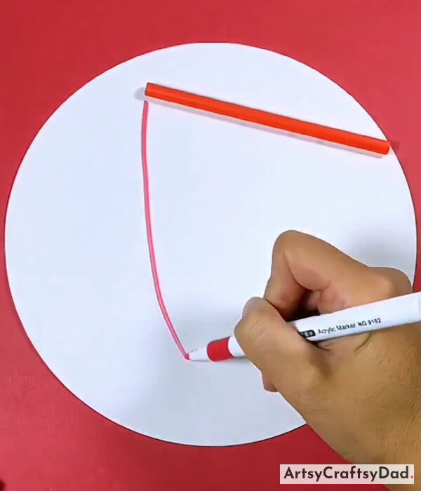 Drawing A Curved Line By Using A Red Color Pen