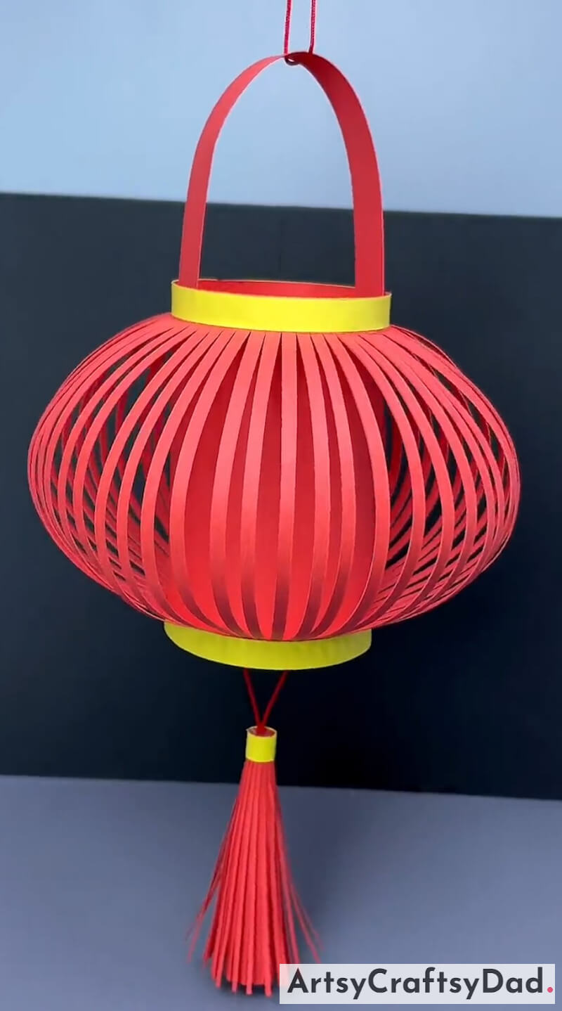 Simple To Make Origami Paper Hang Lantern Craft For Kids-Crafts for kids that promote sustainability through the use of recycled materials