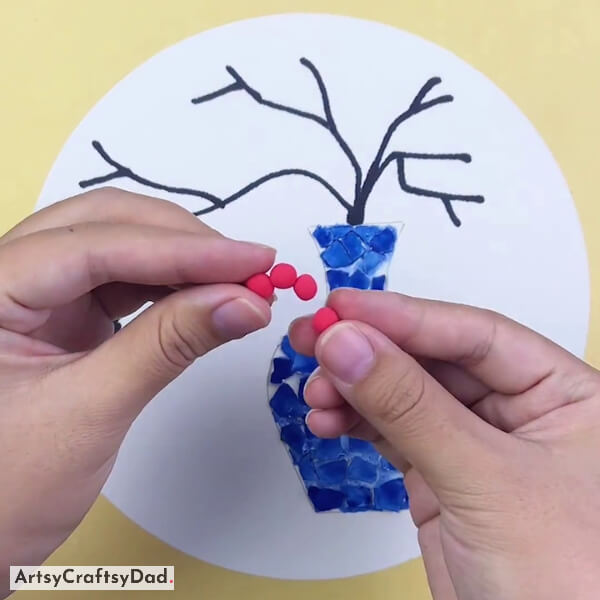 Making Flower With Red Clay Balls
