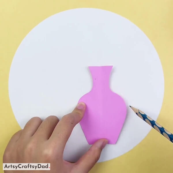 Tracing The Outline Of The Cut Flower Vase